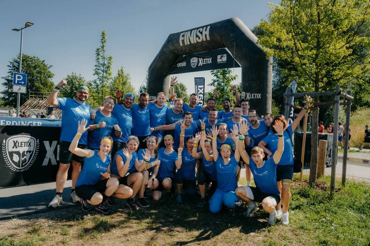 The proQtech team crossing the finish line together at the XLETIX charity run